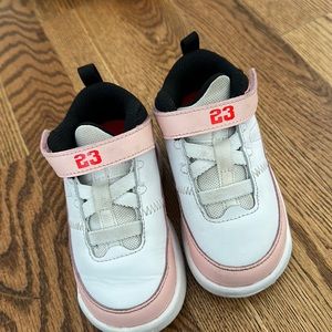 Jordan’s pink and white lightly used. Toddler size 7.